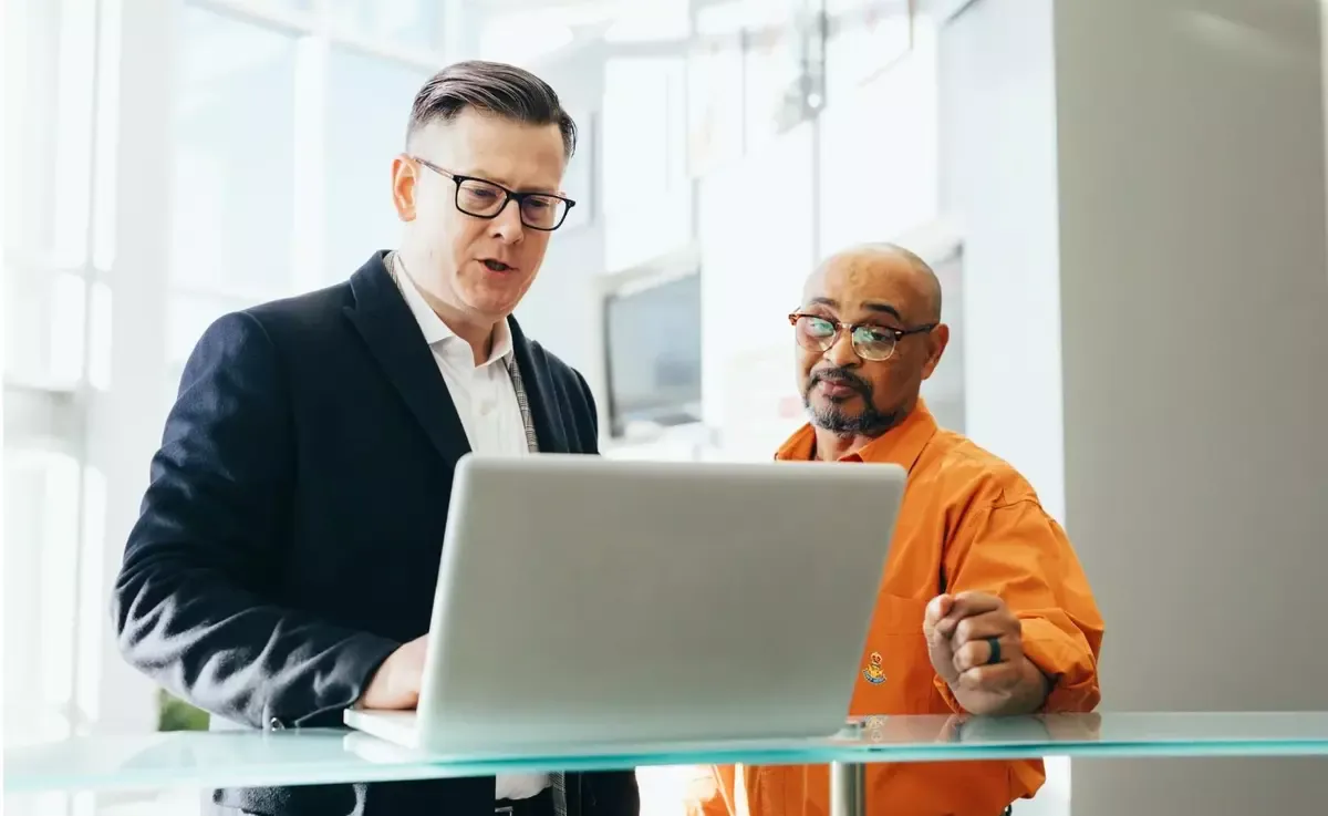 Engineer talking with businessman